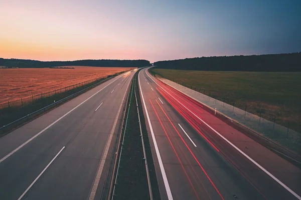 Highway vid soluppgången — Stockfoto