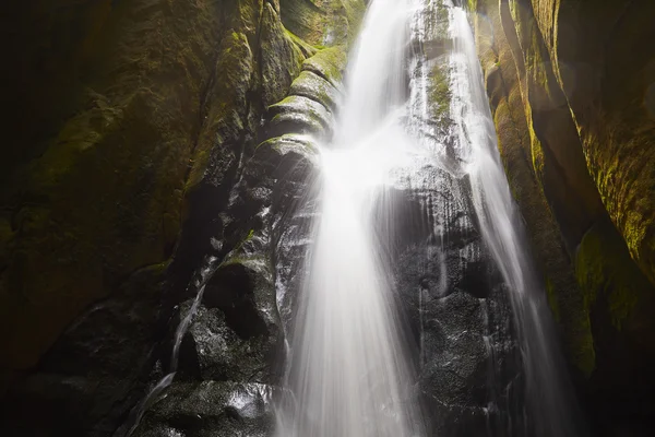 Waterfall among rock walls — Stock Photo, Image