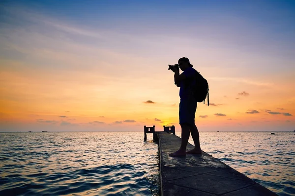 Fotógrafo ao pôr-do-sol — Fotografia de Stock