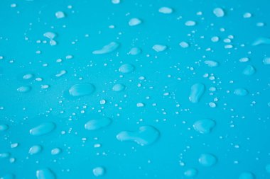 Mavi Arkaplanda Su Damlaları