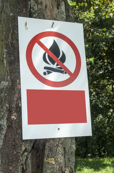 Prohibited fire sign on wood