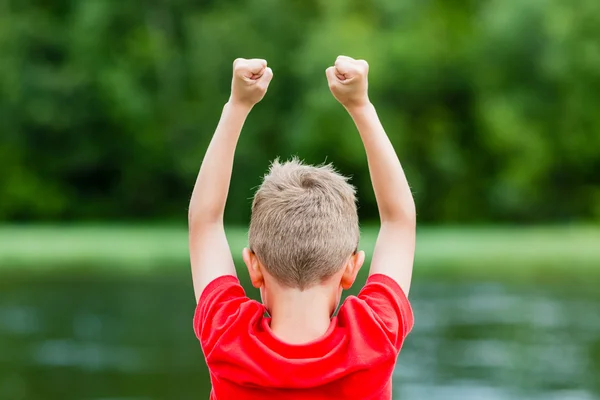 Kid with raised hands — Stock Photo, Image