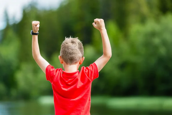 Kid with raised hands — Stock Photo, Image