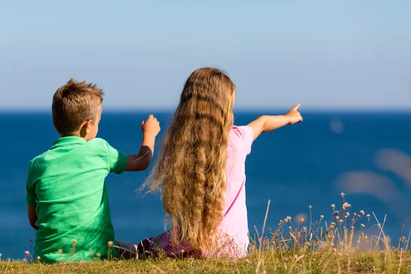 Boy and girl during summer time — Stock Photo, Image