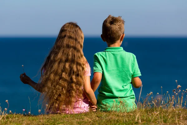 Boy and girl during summer time — Stock Photo, Image