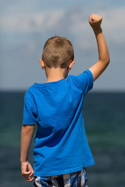 Boy with clenched fist — Stock Photo, Image