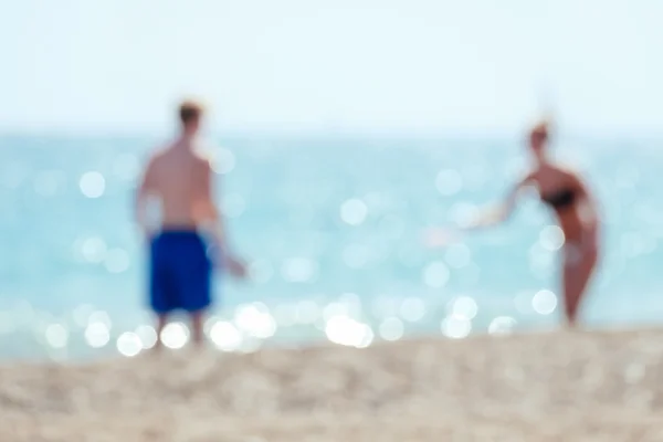 Blurred couple at beach. — Stock Photo, Image