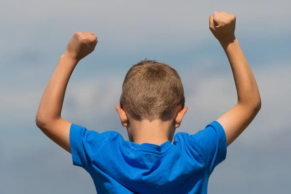 Boy with clenched fists — Stock Photo, Image