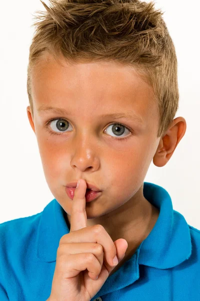 Boy making keep quiet gesture — Stock Photo, Image