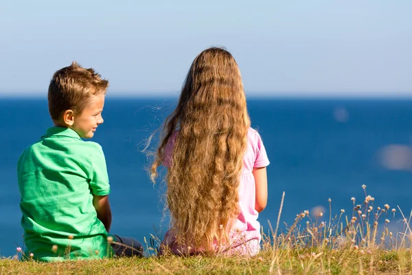 Boy and girl during summer time — Stock Photo, Image