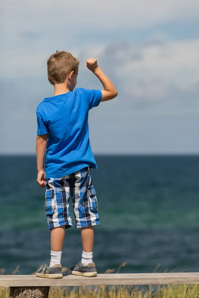 Boy with clenched fist — Stock Photo, Image