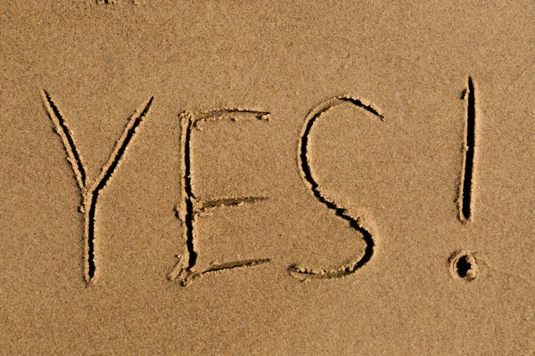 Yes written in sand — Stock Photo, Image