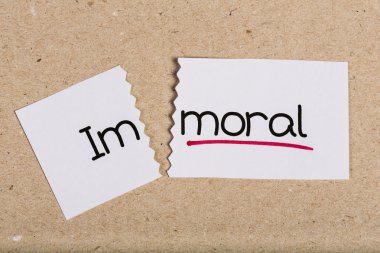 Sign with word immoral turned into moral clipart