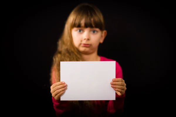 Sad girl with blank white sign — Stock Photo, Image