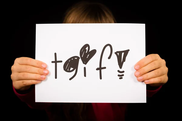 Child holding TGIF sign — Stock Photo, Image