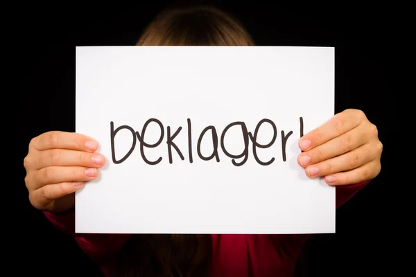 Дитина холдингу знак з норвезької словом Beklager - жаль — стокове фото