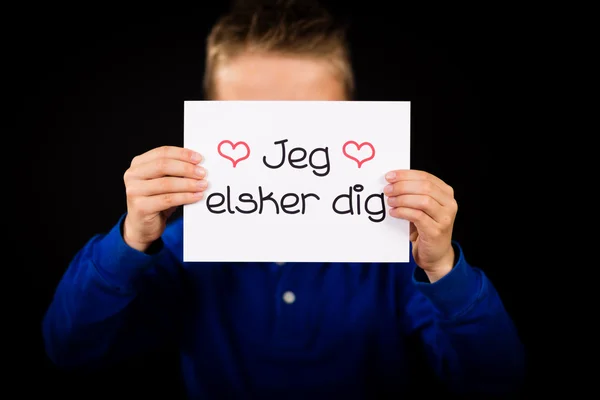 Dítě drží ceduli s dánskými slova Jeg Elsker Dig - I Love You — Stock fotografie