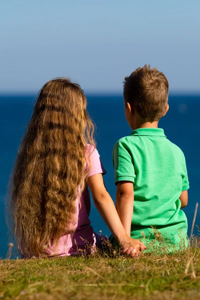 Boy and girl during summer time — Stock Photo, Image