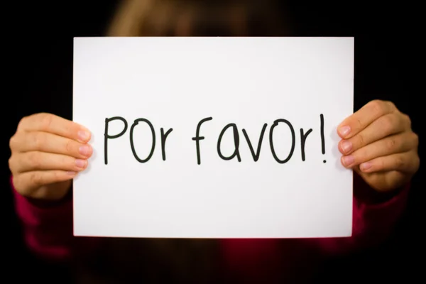 Child holding sign with Spanish words Por Favor - Please — Stock Photo, Image