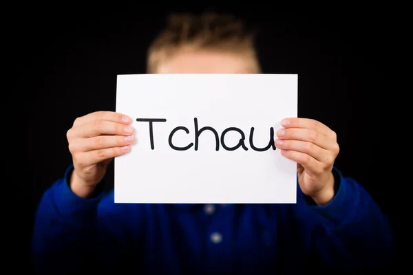 Kind houden teken met Portugese woord Tchau - See You Later — Stockfoto