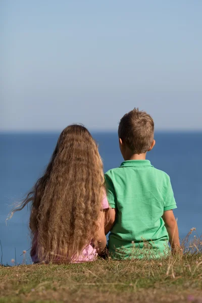 Boy and girl during summer time — Stock Photo, Image