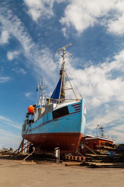 Fishing vessel in dock clipart