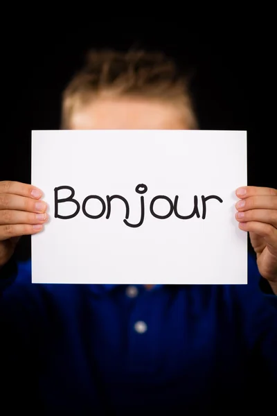 フランス語で Bonjour - ハローと記号を保持している子 — ストック写真