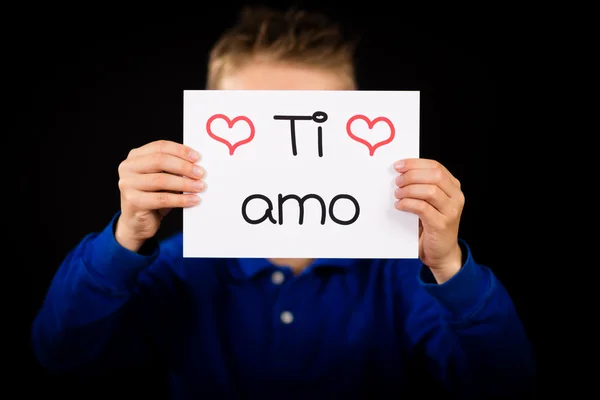 イタリア語と記号を抱いた子供 Ti Amo - 私は愛あなたの言葉します。 — ストック写真