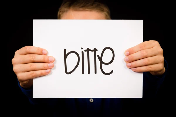 Child holding sign with German word Bitte - Please — Stock Photo, Image