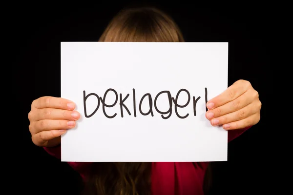 Child holding sign with Norwegian word Beklager - Sorry — Stock Photo, Image