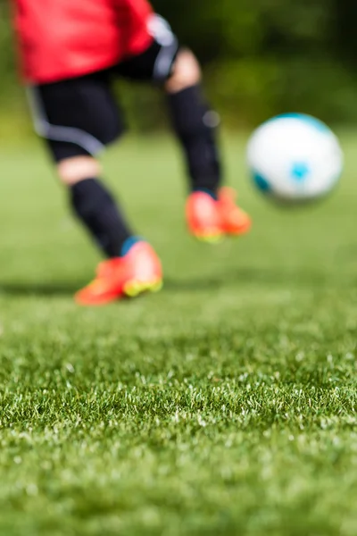 Crianças futebol borrão — Fotografia de Stock