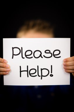 Lütfen işaret tutan çocuk