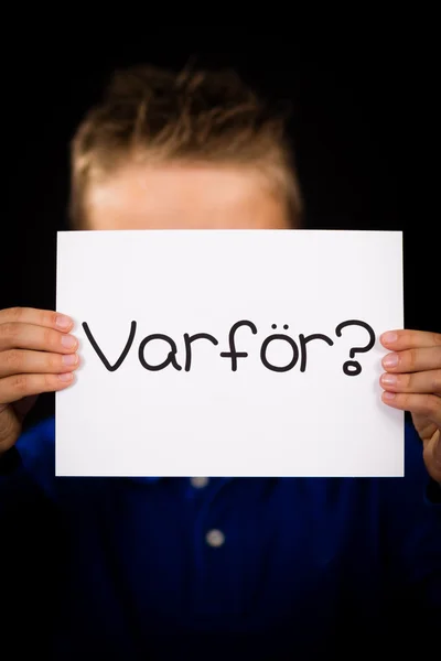 Child holding sign with Swedish word Varfor - Why — Stock Photo, Image