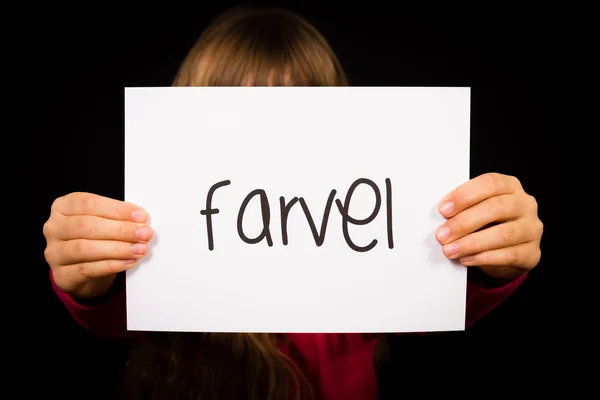 Kind hält Schild mit dänischem Wort farvel - bye — Stockfoto