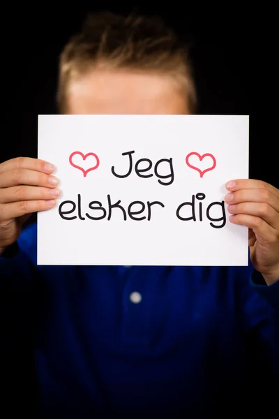 Dziecko trzyma znak z duńskim słowa Jeg Elsker Dig - kocham cię — Zdjęcie stockowe