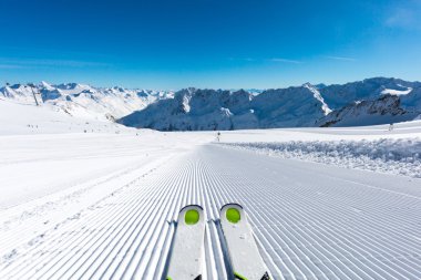 Skis on ski slope clipart