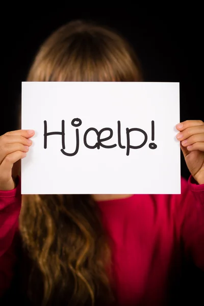 Kind houden teken met Deense woord Hjaelp - Help — Stockfoto