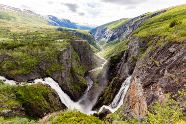 Voringsfossen waterfalls near Hardangervidda in Norway clipart