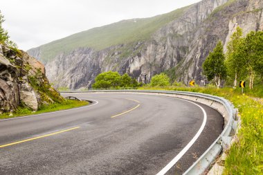 Hardangervidda road in Norway clipart