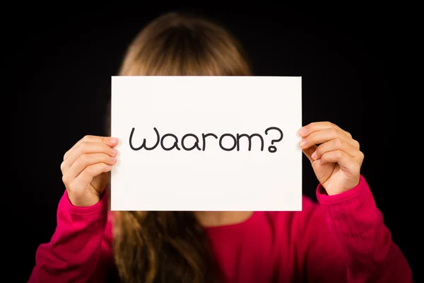 Child holding sign with Dutch word Waarum - Why — Stock Photo, Image