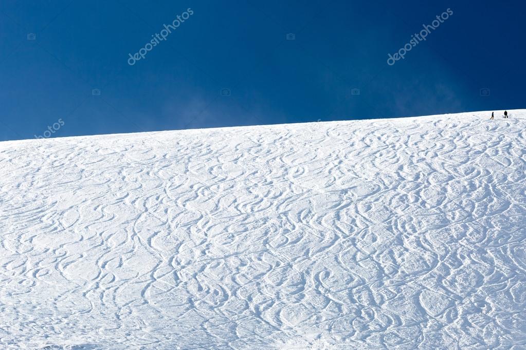 Off piste ski tracks on powder snow