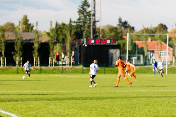 Wazig voetbalspelers amateur voetbalwedstrijd — Stockfoto