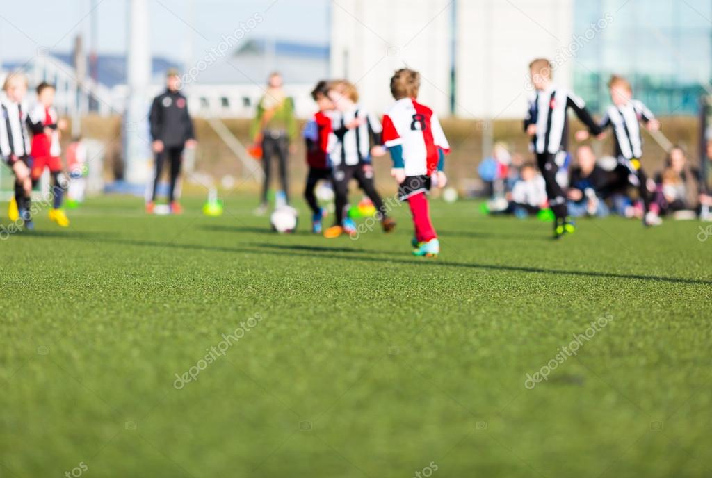 Blur of boys playing soccer