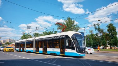Moscow, Russia - May 26, 2021: View of the new Russian tram running along Kalanchevskaya Street in Moscow