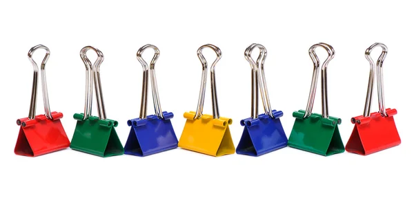Color binder clips on white background — Stock Photo, Image