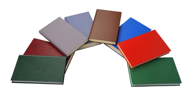 Closeup of semicircle of colorful books on white background — Stock Photo, Image