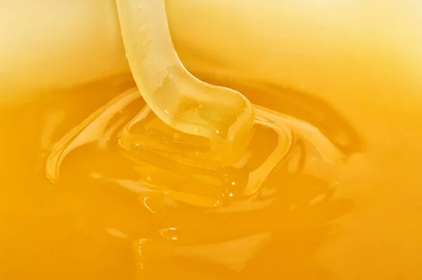 Flowing Delicious Honey Yellow Background — Stock Photo, Image