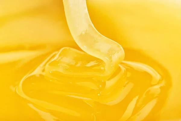 Flowing Delicious Honey Yellow Background — Stock Photo, Image