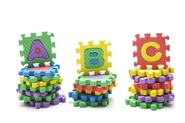 "ABC "written with alphabet puzzle — стоковое фото