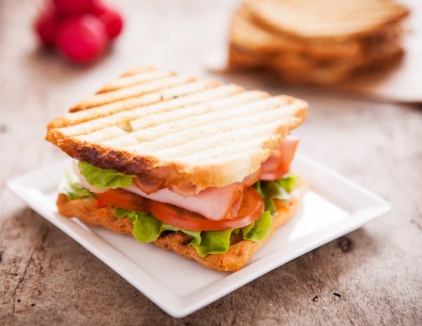 Toast Sandwich on wooden bench